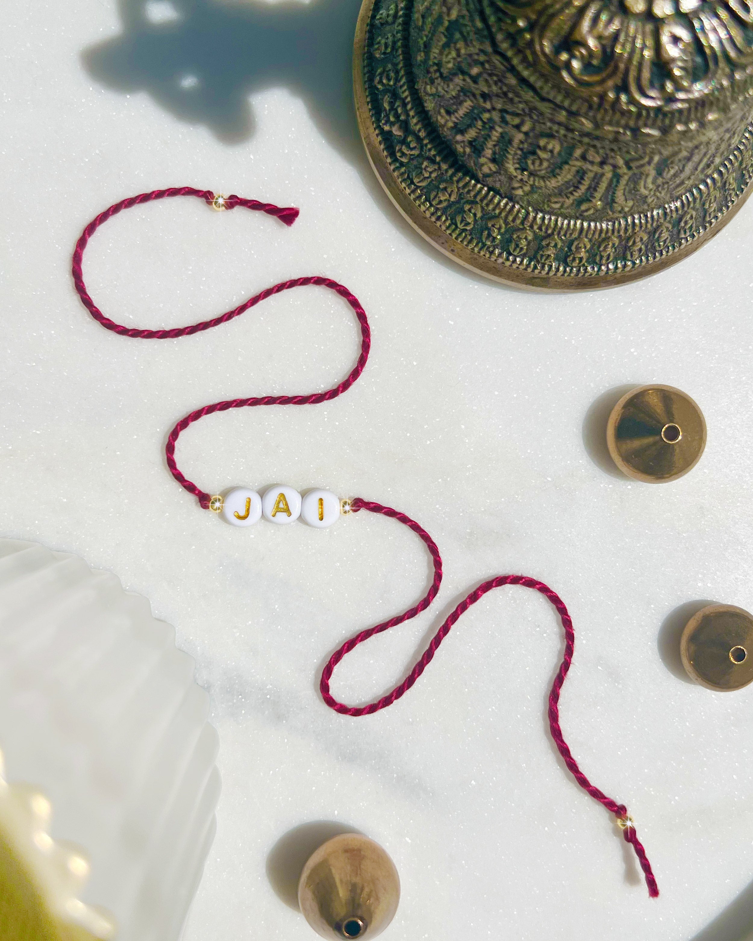 Autograph - Round Bead Rakhi
