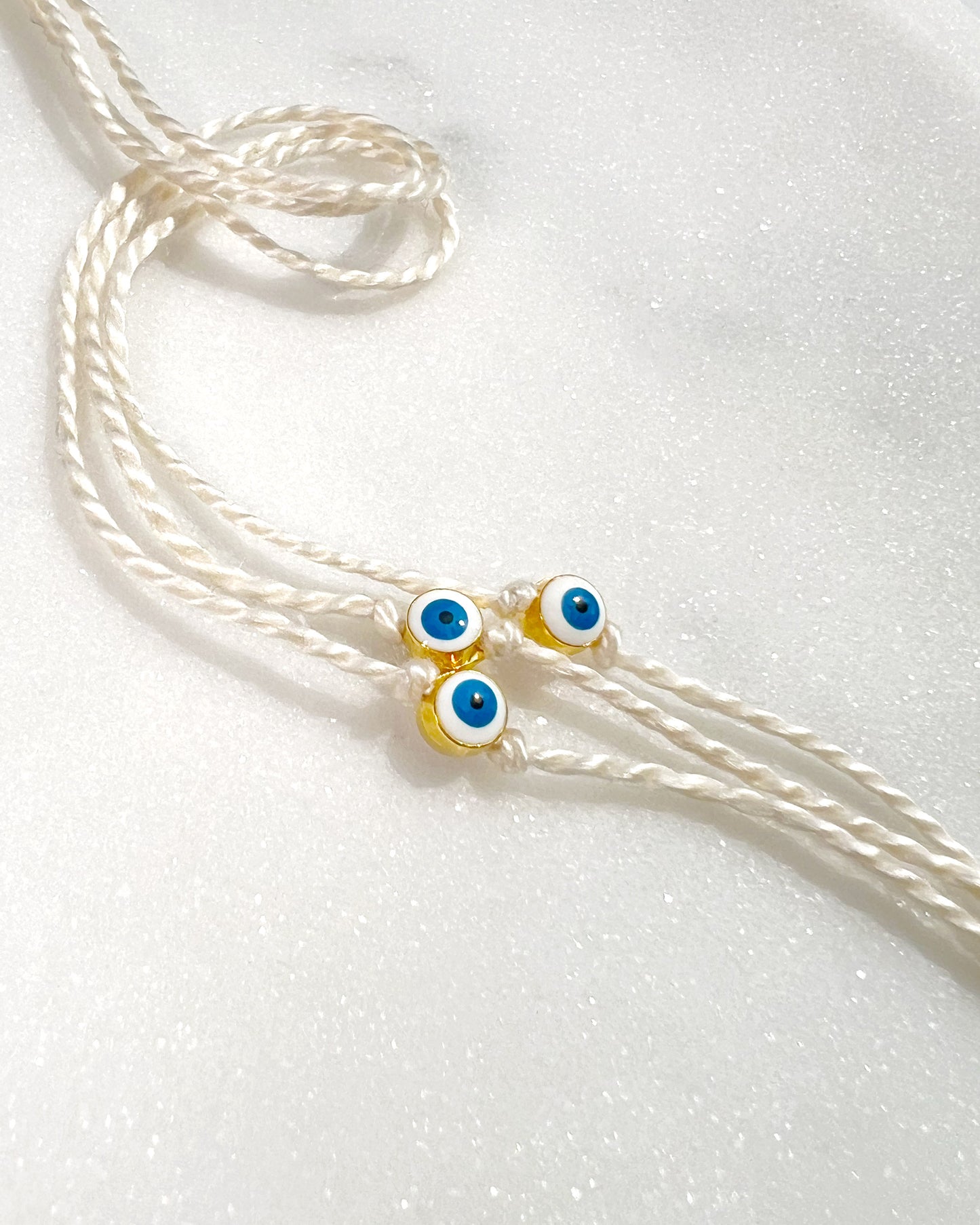 Mini White and Blue Evil Eye Rakhri 🧿