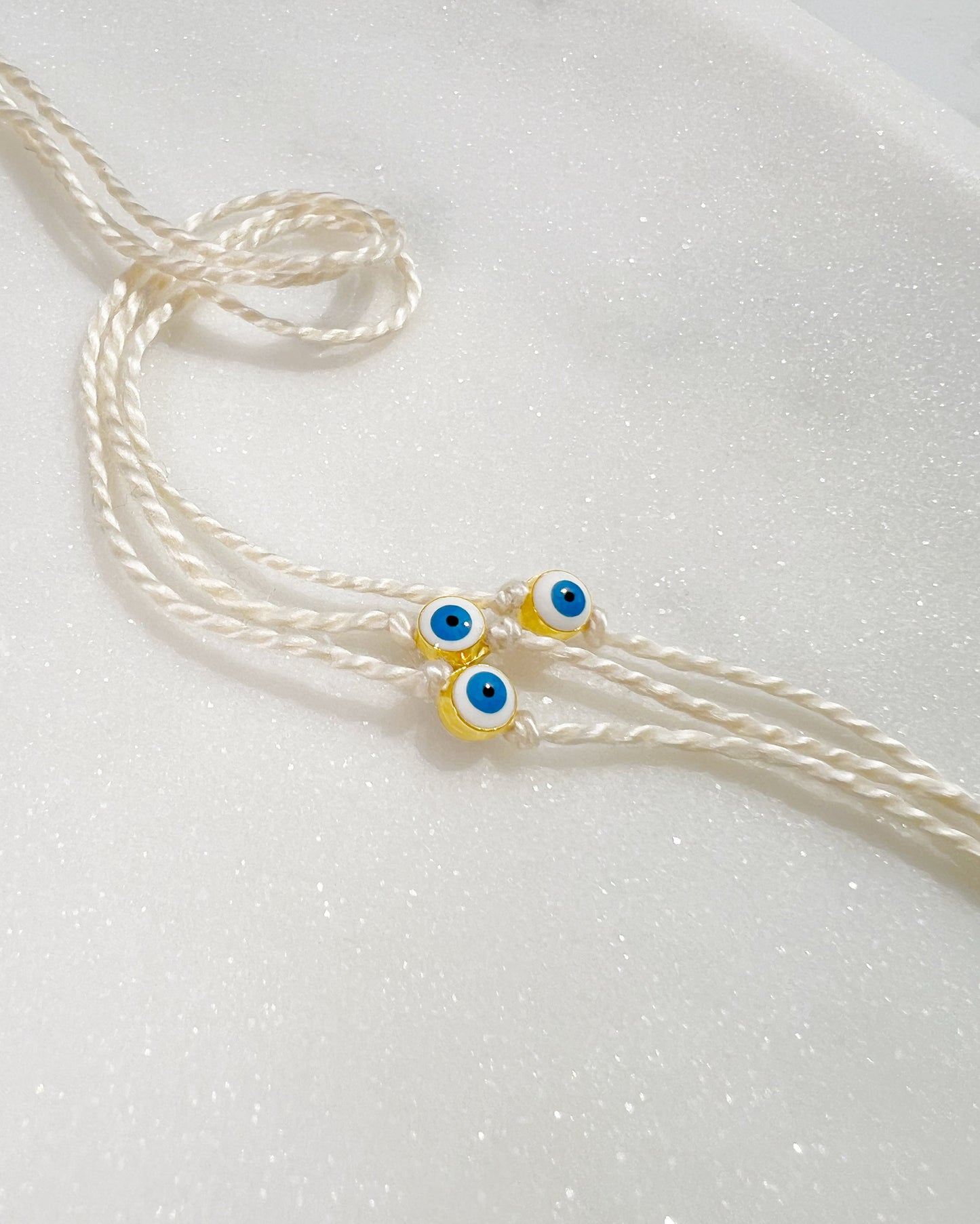 Mini White and Blue Evil Eye Rakhri 🧿