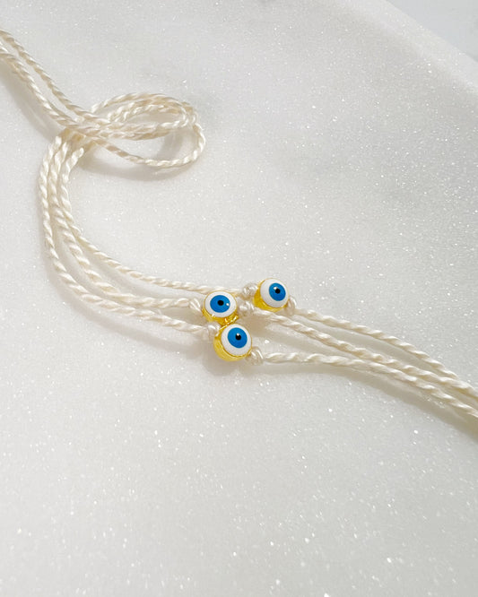 Mini White and Blue Evil Eye Rakhri 🧿