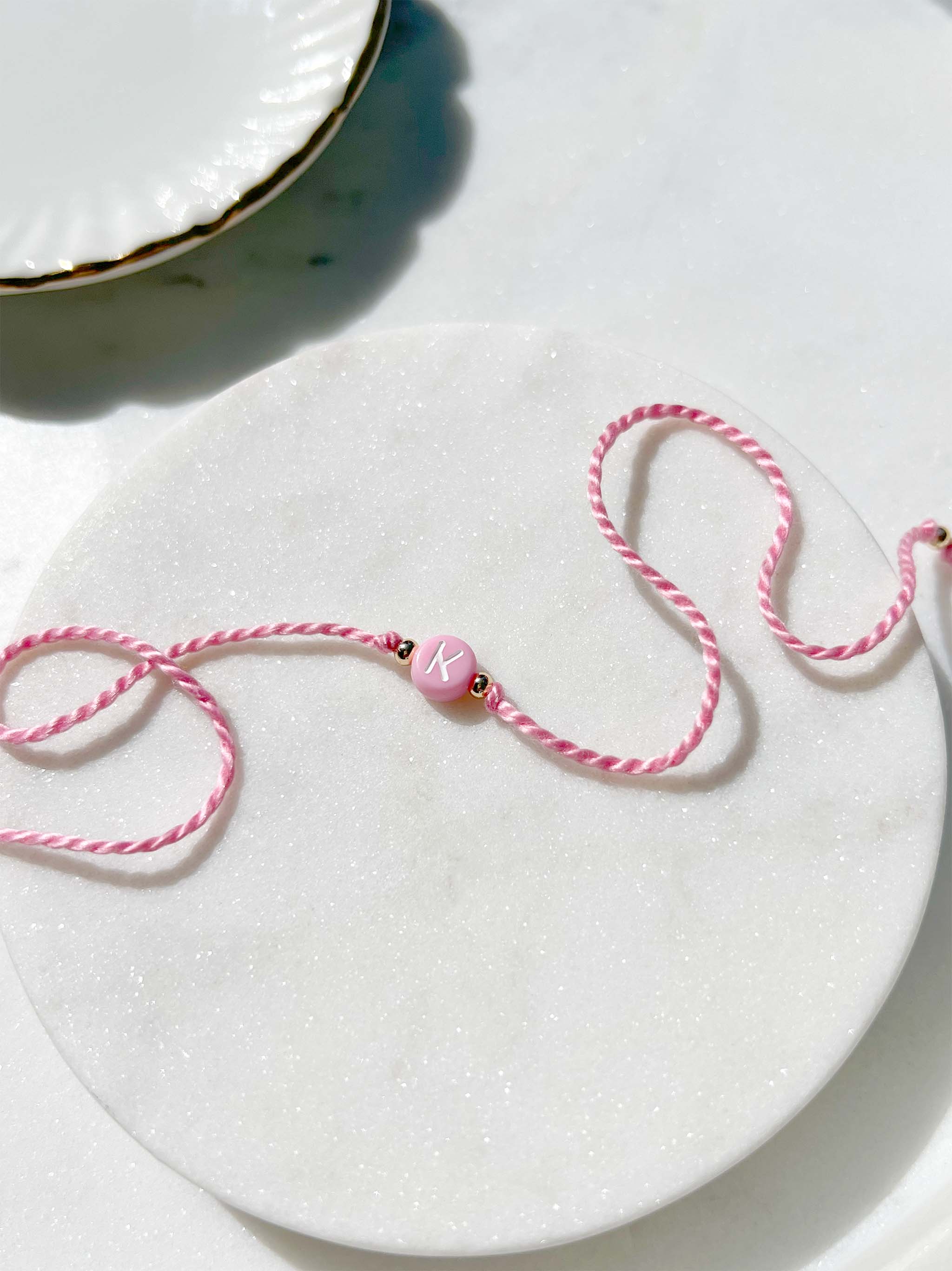 Pastel Pink Initial Rakhi