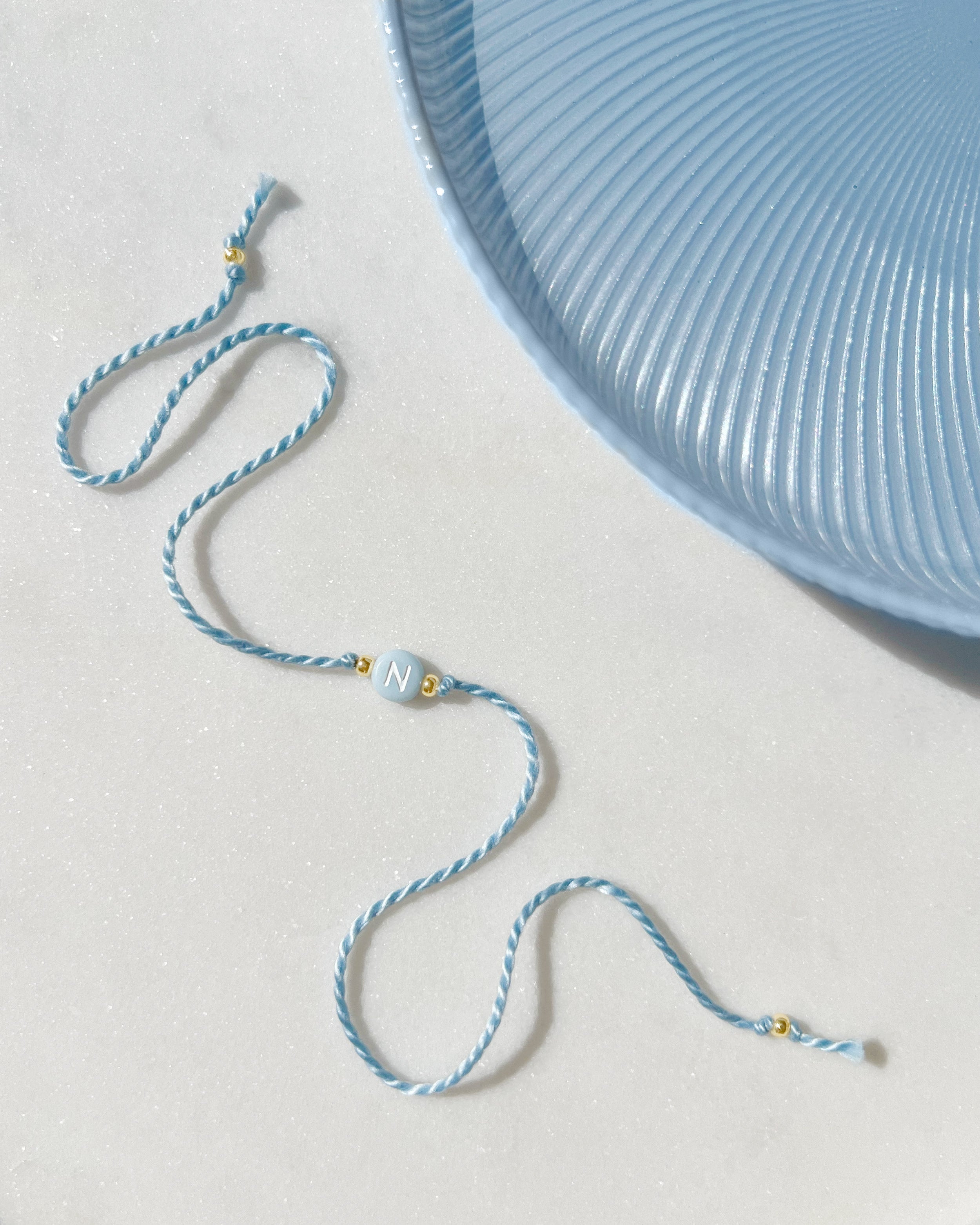 Pastel Blue Initial Rakhi