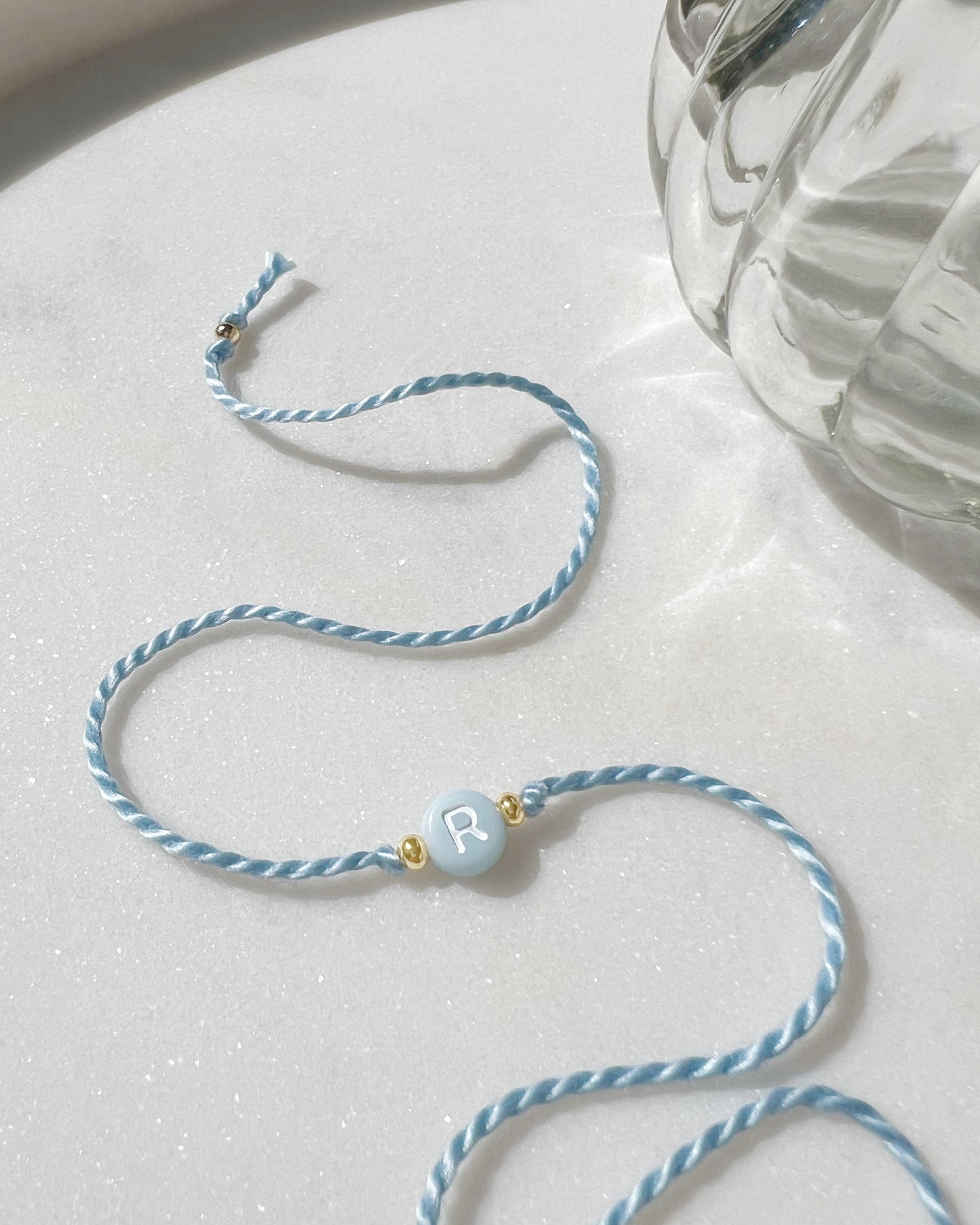 Pastel Blue Initial Rakhi 🩵